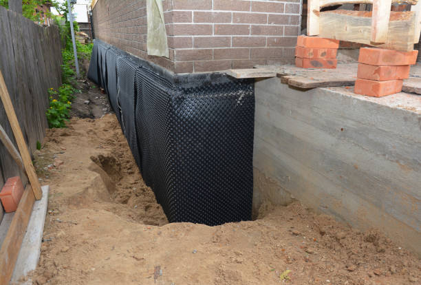 Happy homeowners after waterproofing job in Spotswood